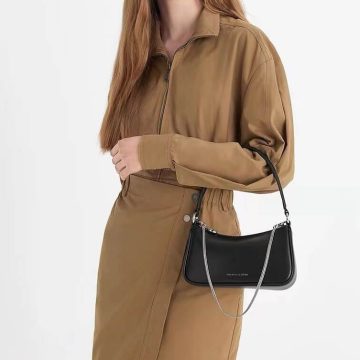 Charles & Keith Bag in Metallic Curved Shoulder Bag Black - AjmanShop